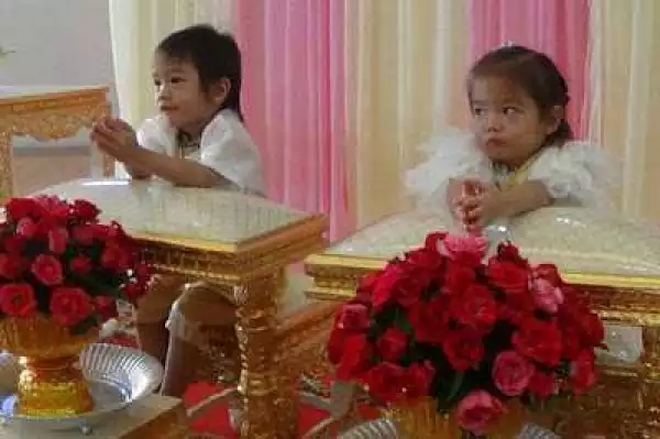 Parents marry their 3-year-old twins to each other “to avoid bad luck” (PHOTOS)